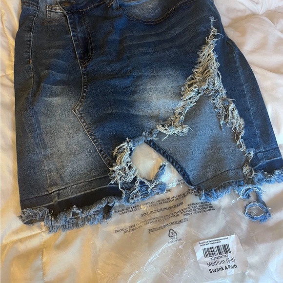 Asymmetrical distressed denim skirt. Size Medium (6-8). Never worn. - Picture 4 of 4